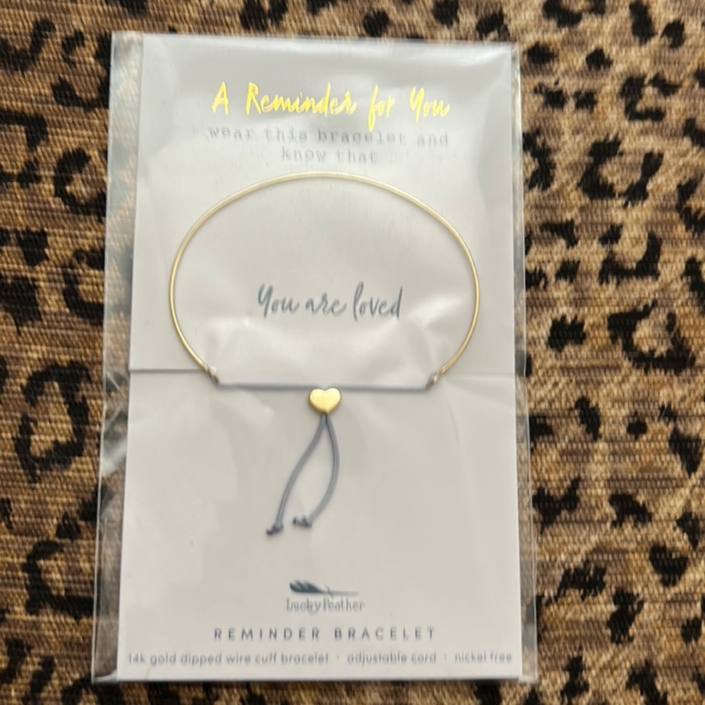 Lucky feather reminder bracelet